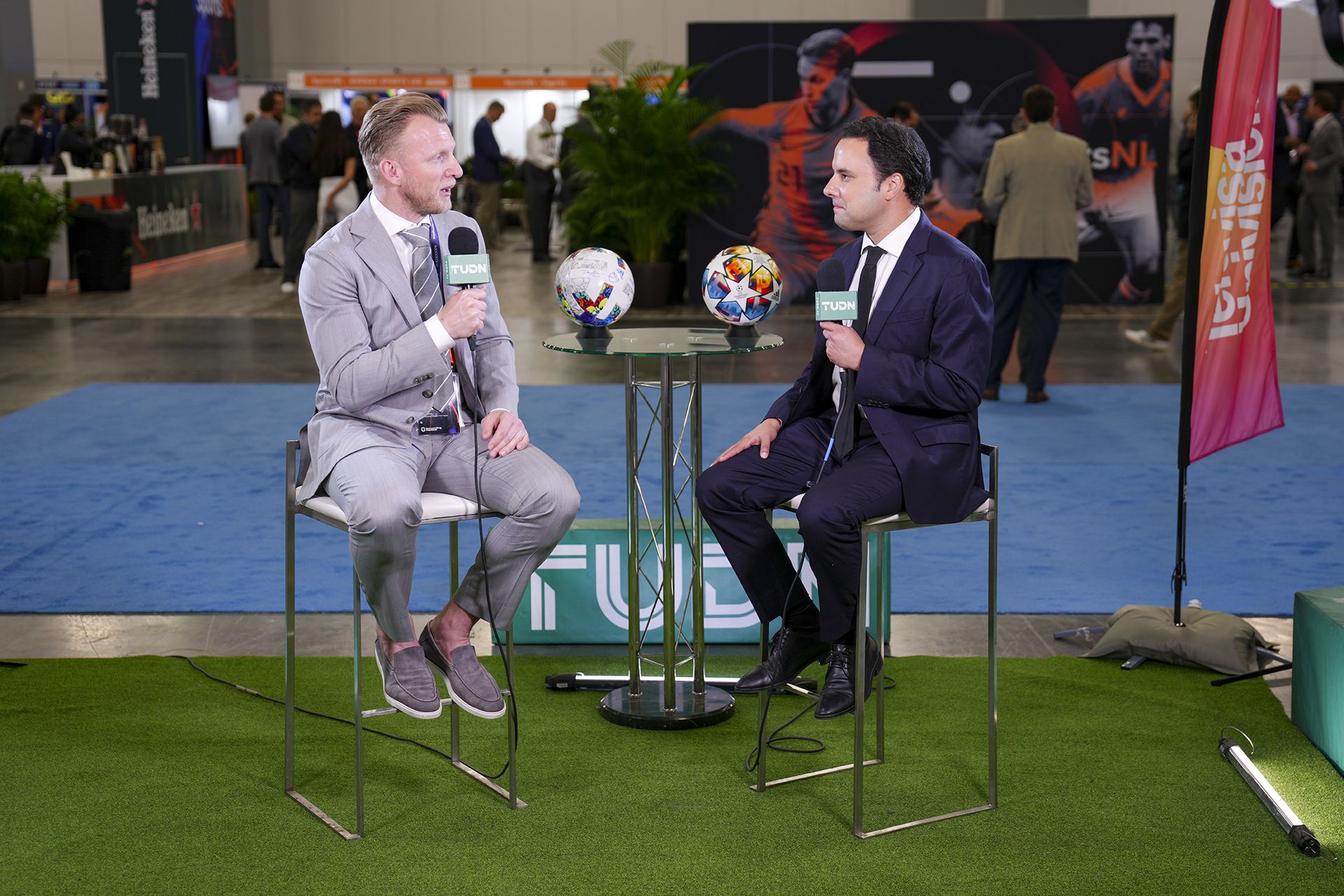 MIAMI, FL - MARCH 15: Dirk Kuyt is interviewed by Alejandro Berry during Day 1 of SoccerEx at the Miami Beach Convention Center on March 15, 2022 in Miami, Florida. (Photo by Eric Espada/Getty Images for Soccerex)